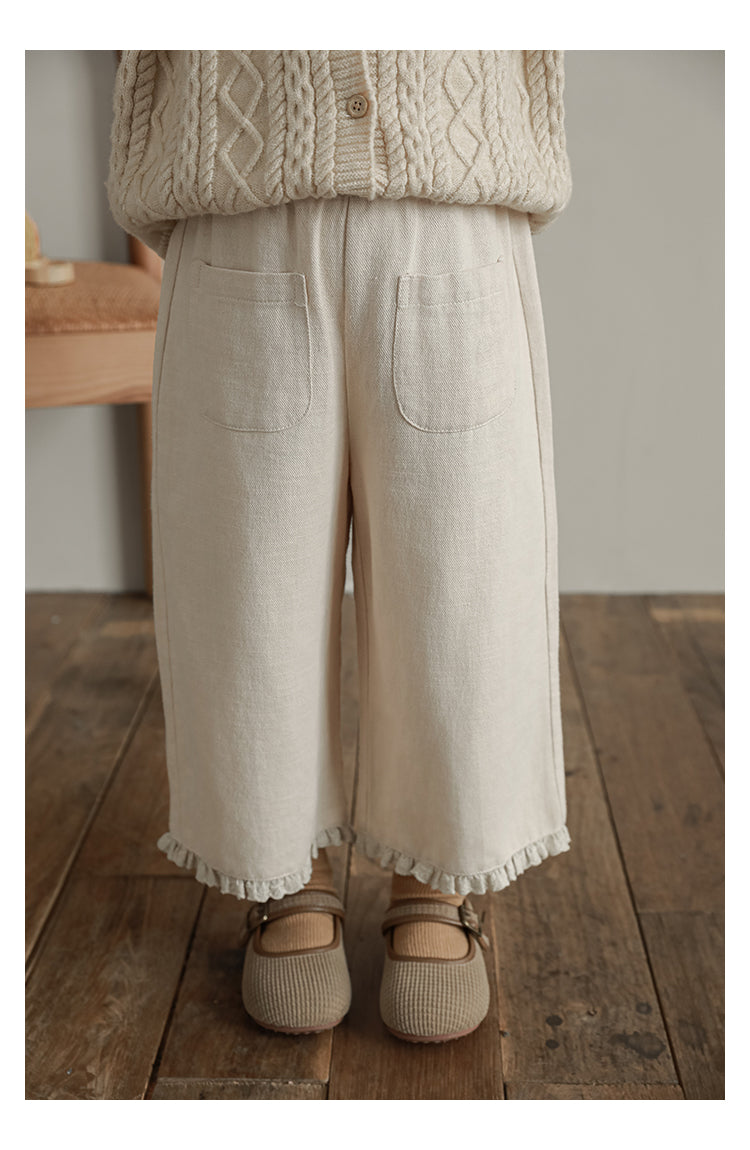 Soft breathable smart trousers for kids featuring ruffled lace trim - Ava & Bear London