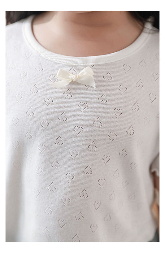 Heart-shaped pattern and pointelle detail on white summer girls T-shirt, by Ava & Bear London