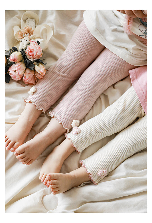 Lightweight cotton leggings for girls with delicate detailing