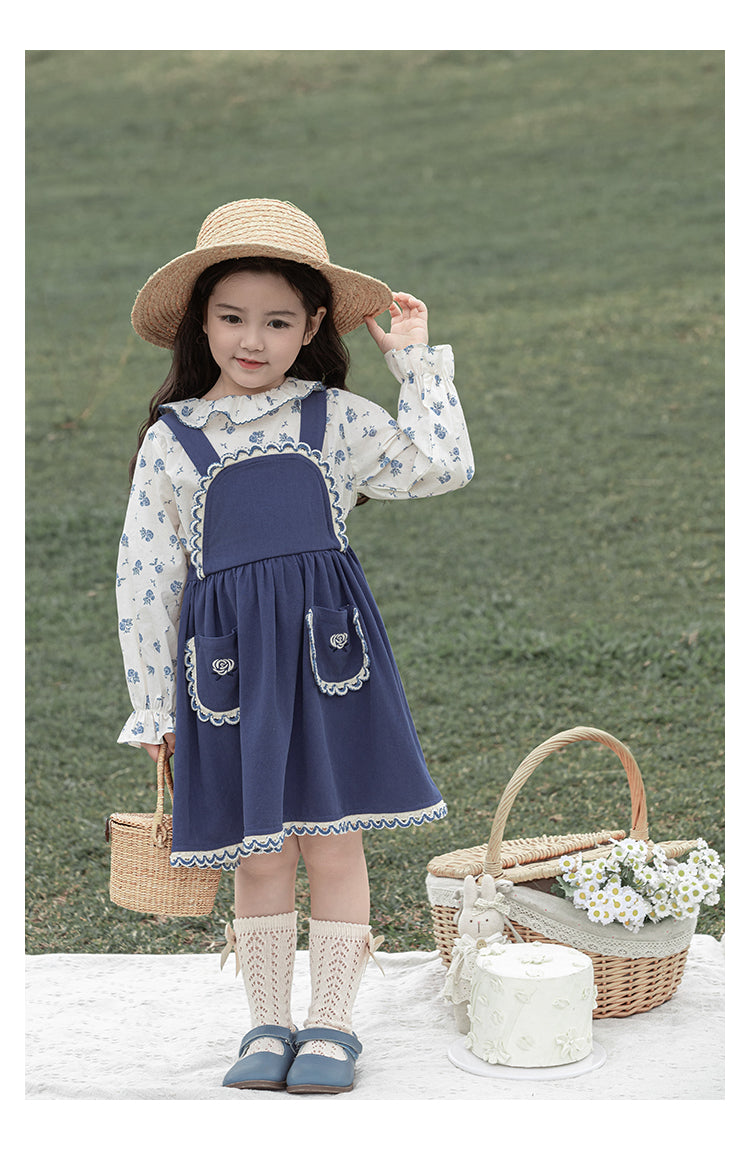 Girl wearing floral lightweight cotton top with peter pan collar