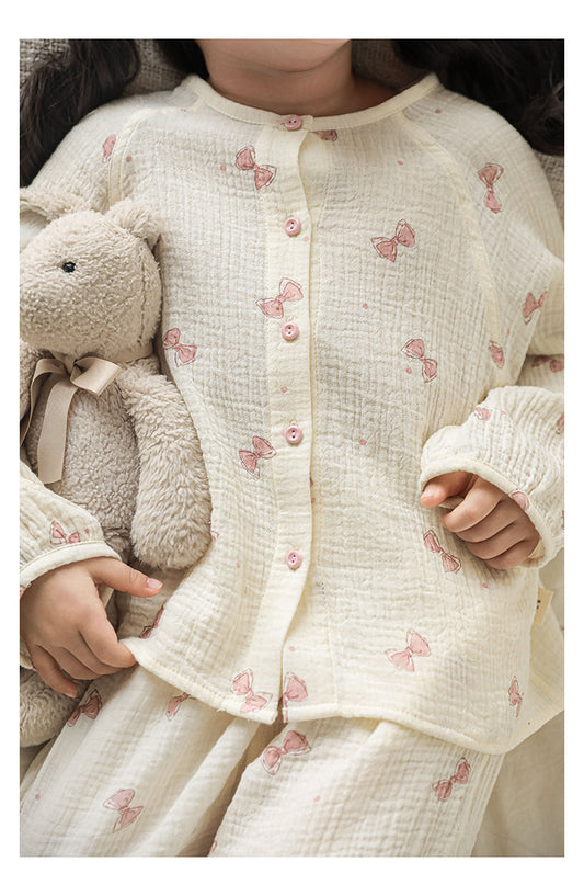 Girls’ summer pyjama set in lightweight cotton with playful bow design