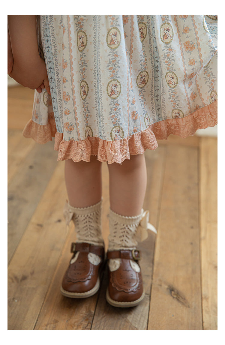 Close-up of ruffled hem on girls dress
