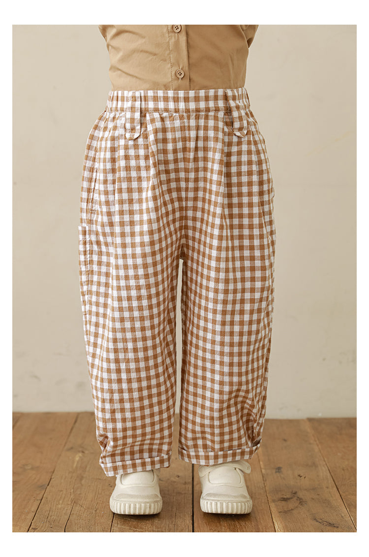 Lightweight breathable gingham trousers for girls featuring classic pleats
