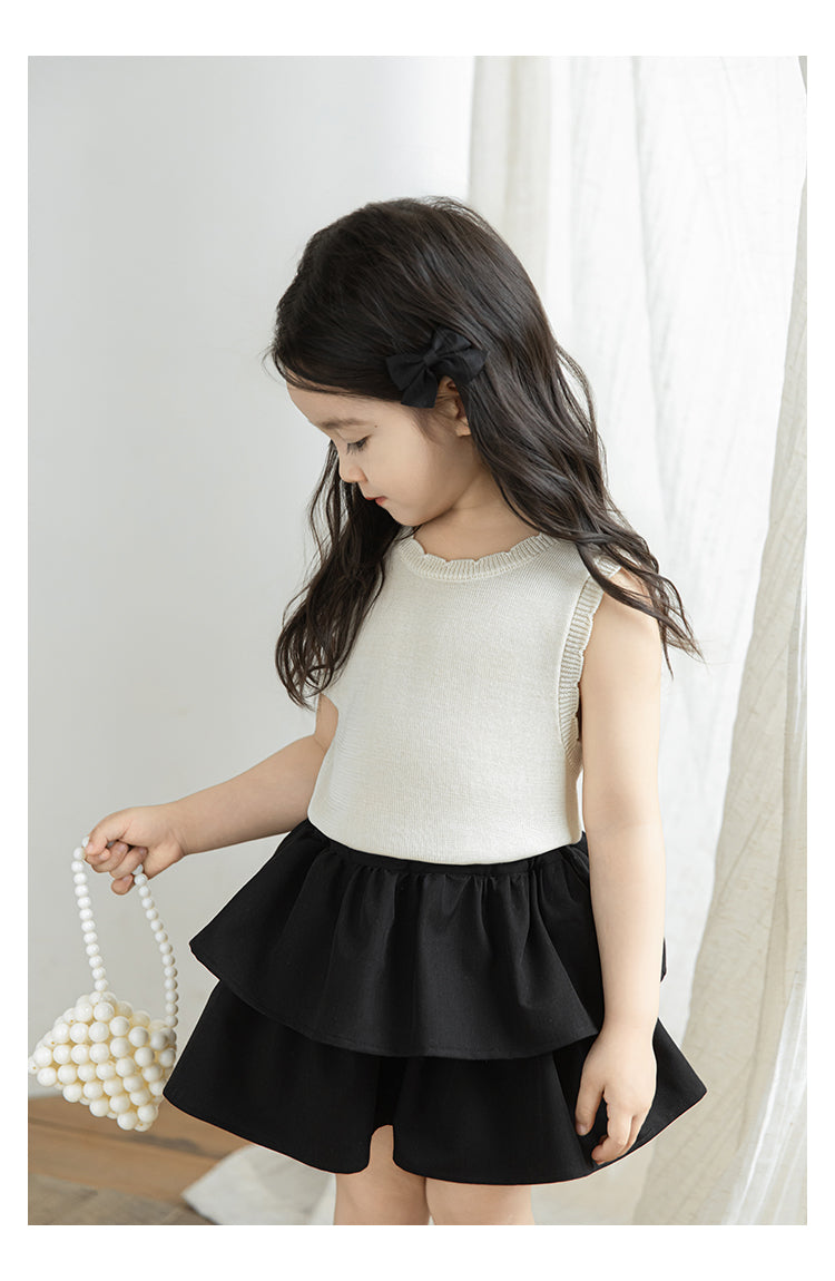 Soft breathable girls tank top made from sustainable lyocell fabric, in cream colour