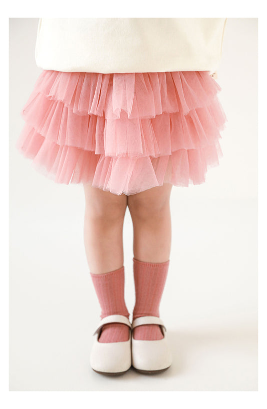 Girl wearing a tutu skirt with comfortable fit and delicate design
