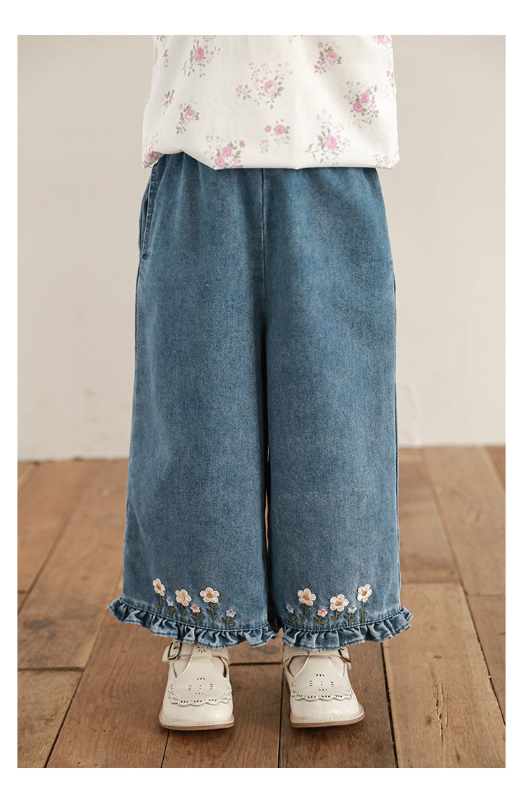 Flowy wide-leg girls jeans with playful ruffles