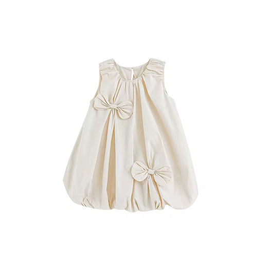 Girls dress with elasticated round neckline and bow detail